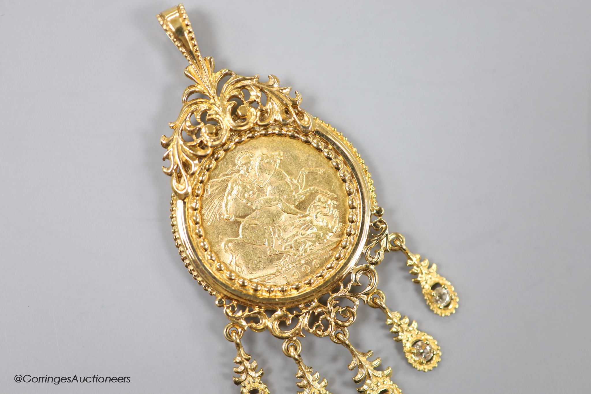 A Victoria 1900 gold sovereign, in a modern 9ct gold pendant tassel drop mount, gross 18 grams.